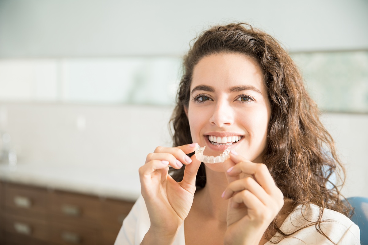 Invisalign for Bite Problems Patient using Invisalign for smile alignment
