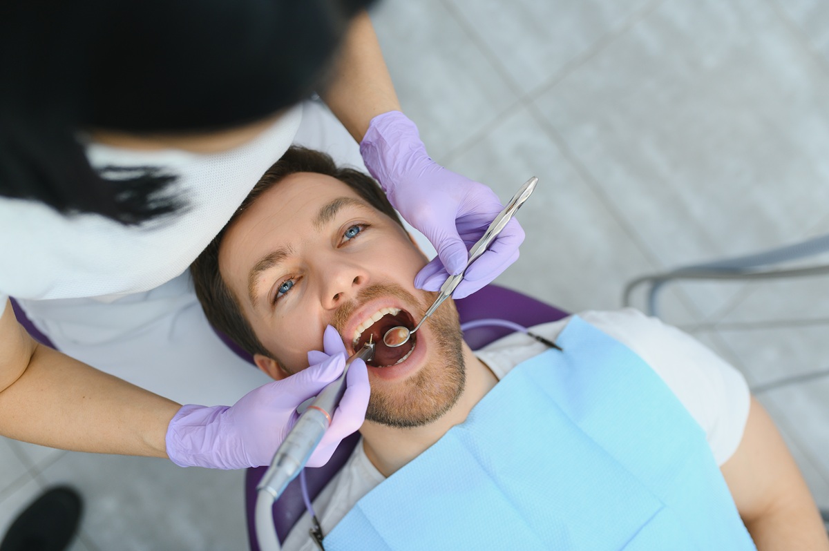 Adult patient receiving an oral examination